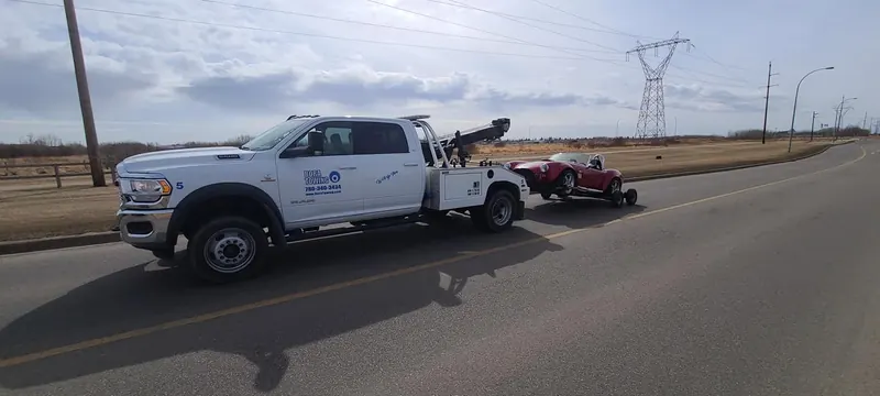 Bora Towing Ram 5500 transporting Shelby Cobra classic car in Edmonton